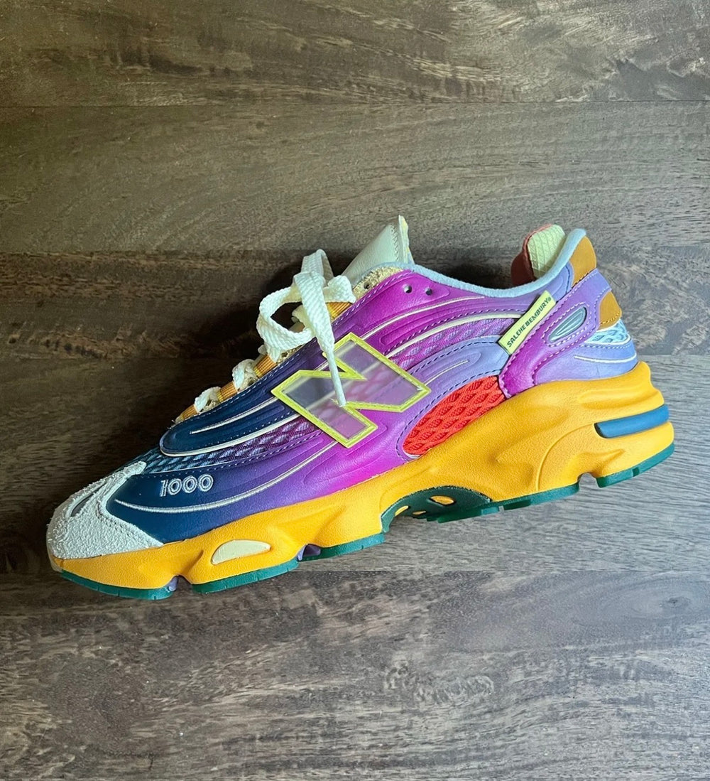 Colorful New Balance 1000 sneakers with purple, blue, yellow uppers and chunky sole