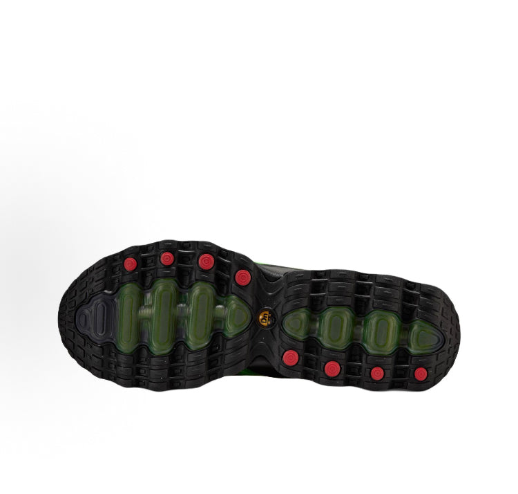 Nike Air Max Dn8 sneaker outsole view, black tread with neon green gel pods and red circles