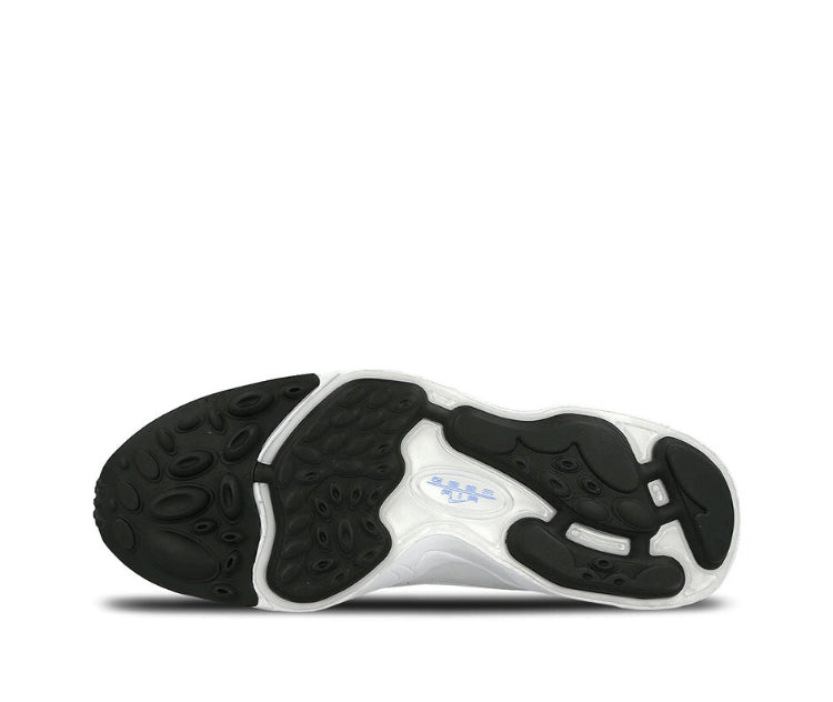 Shoe outsole view with black rubber tread and white midfoot plate