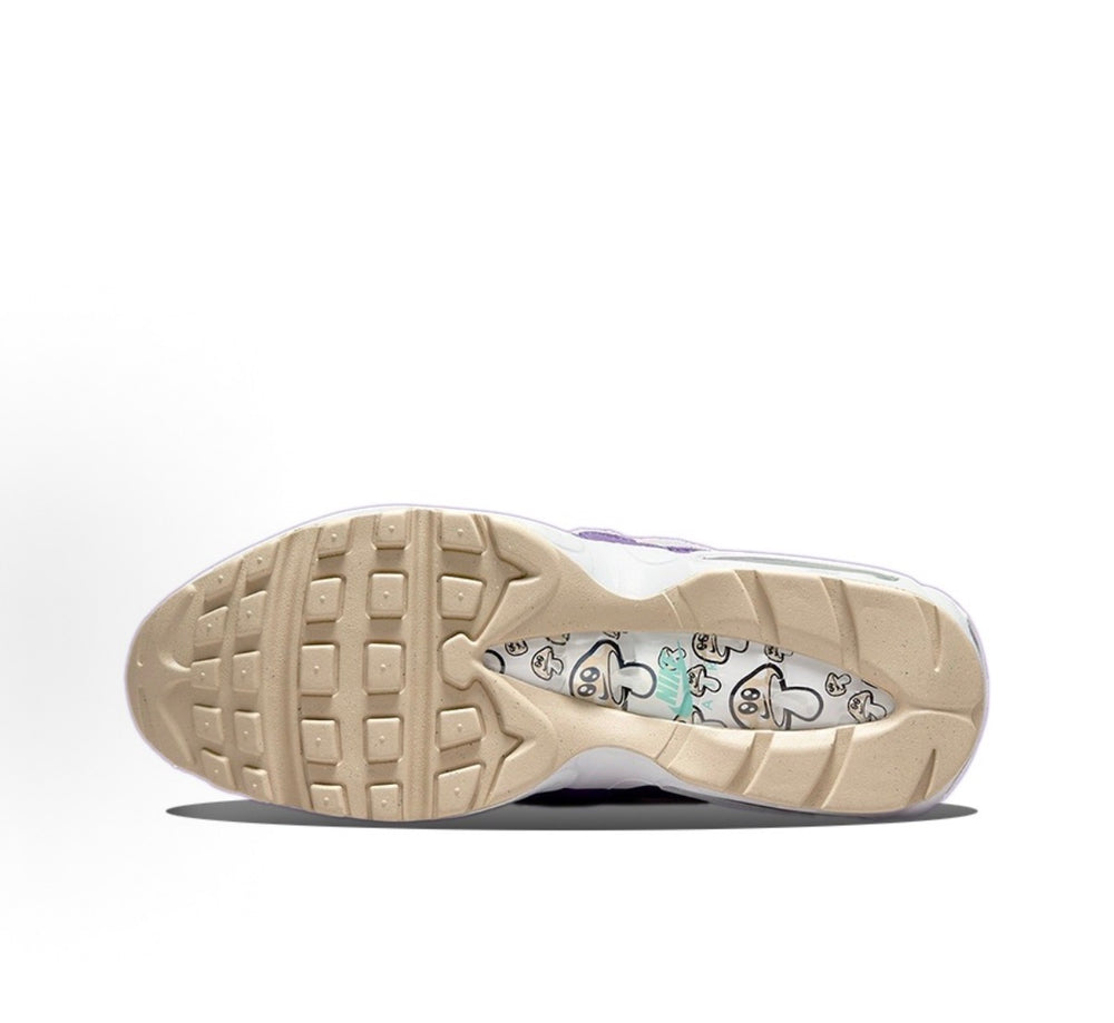 Nike Air Max 95 outsole view with patterned tread and cream rubber base