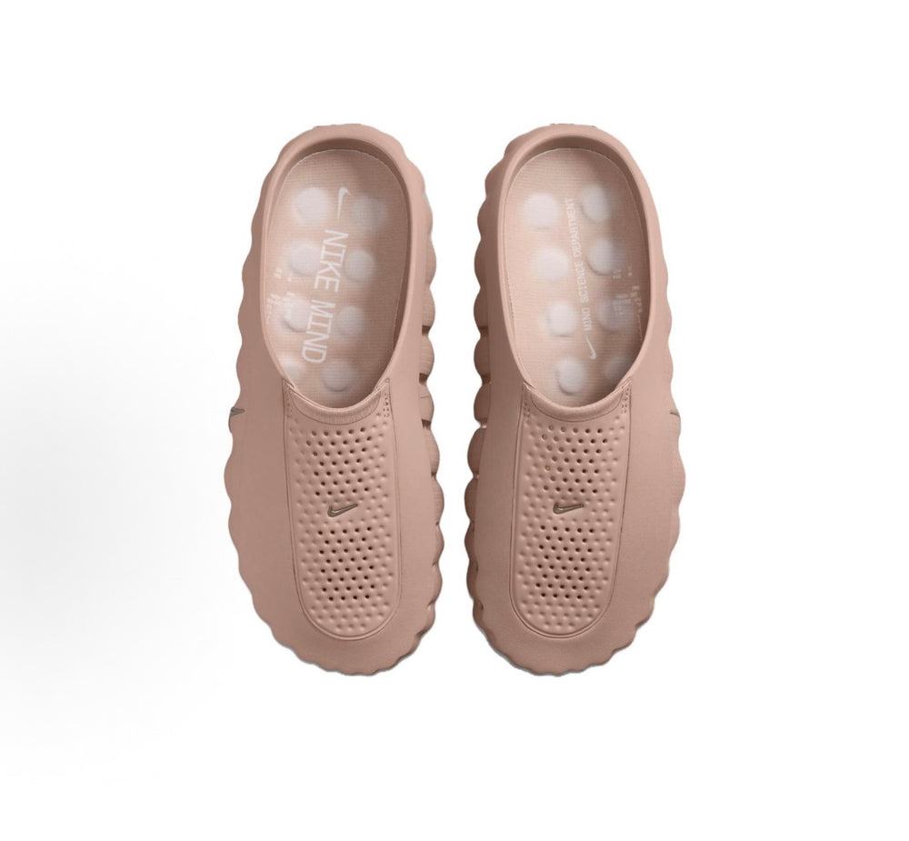 Nike slide sandals in taupe with Nike logo on the insole