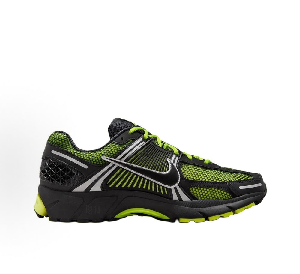 Nike Zoom Vomero 5 running shoes in black with neon green laces and accents