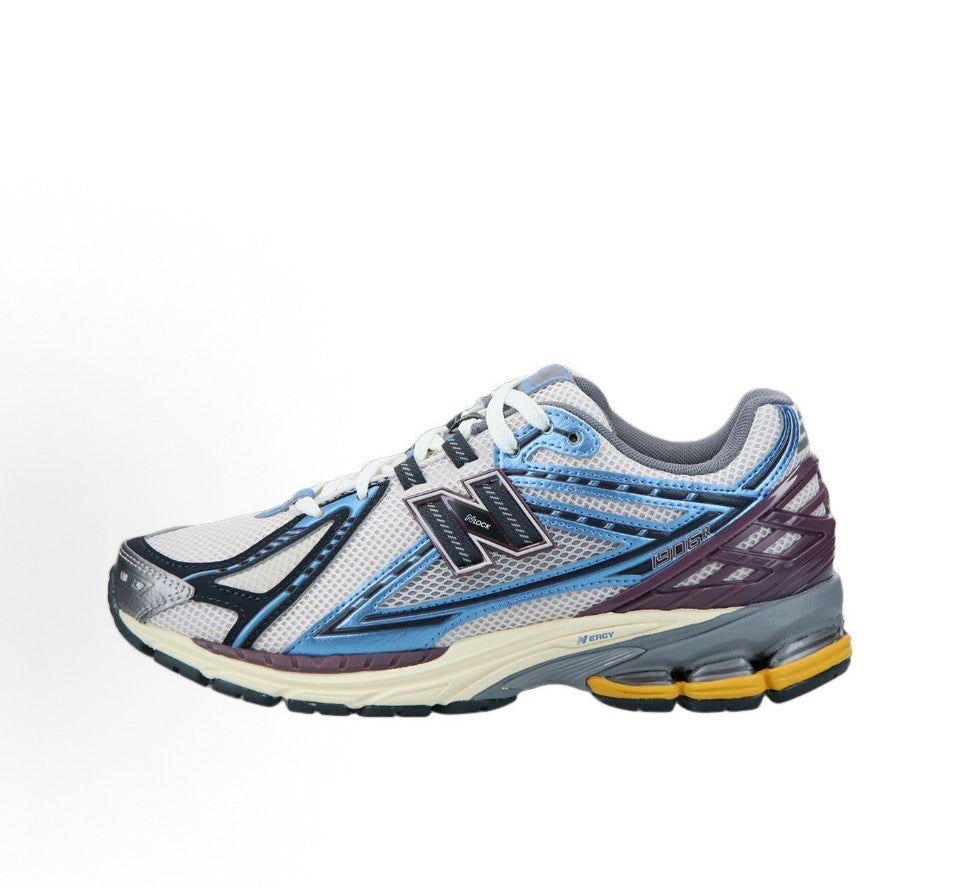 New Balance 1906R front 3/4 view with blue, cream, burgundy details and cushioned sole
