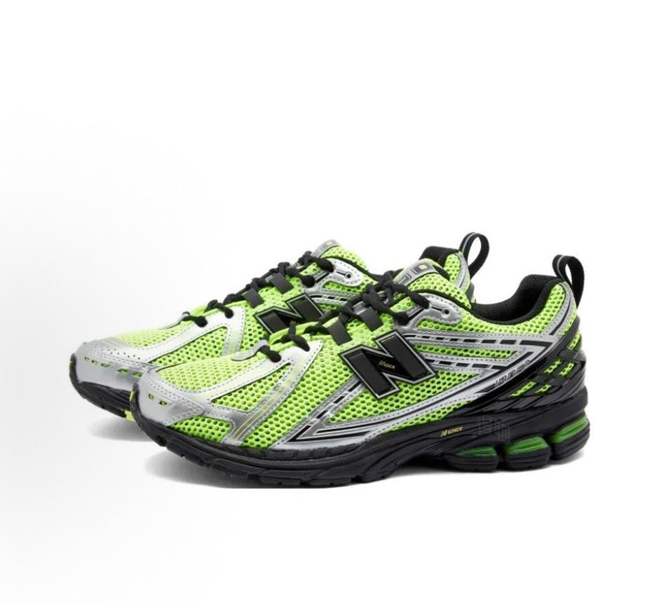 New Balance 1906R sneakers, neon green and grey mesh with black N logo and laces