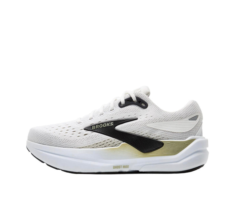 White running shoe with black forefoot panel and light green outsole accents