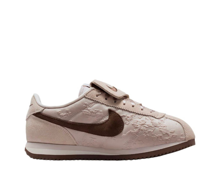 Nike Cortez low-top sneakers in light beige with dark brown Swoosh