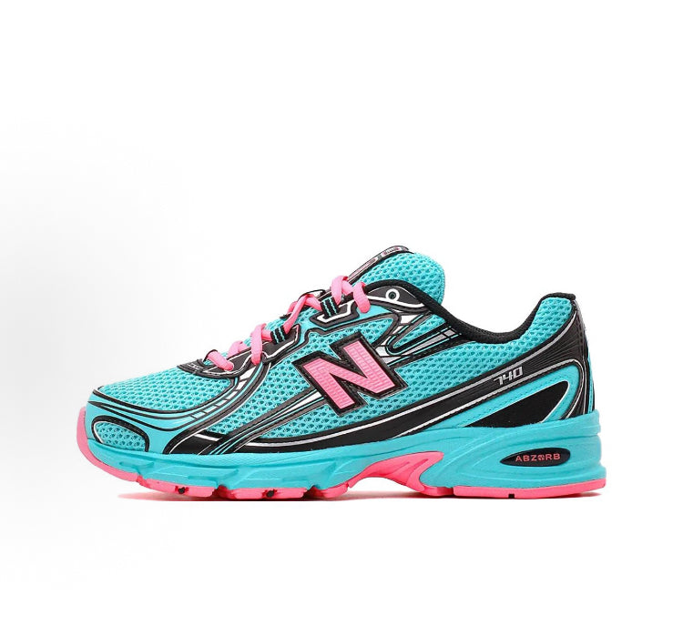 New Balance 740 teal lace-up sneakers with black N logo and pink accents