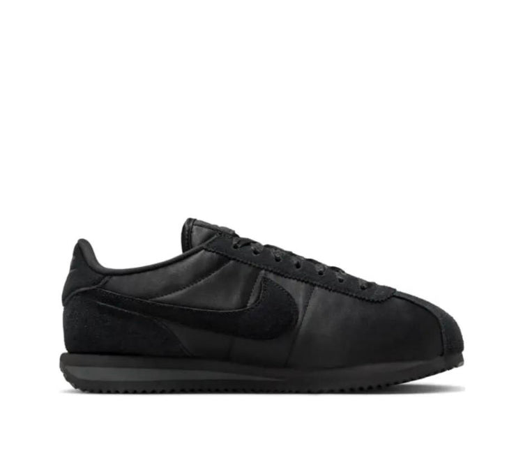 Nike Cortez low-top sneakers in black with suede upper and lace-up design