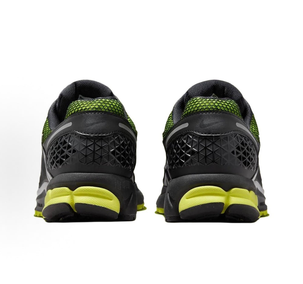 Nike Zoom Vomero 5 sneakers, rear view: black knit upper with neon green sole