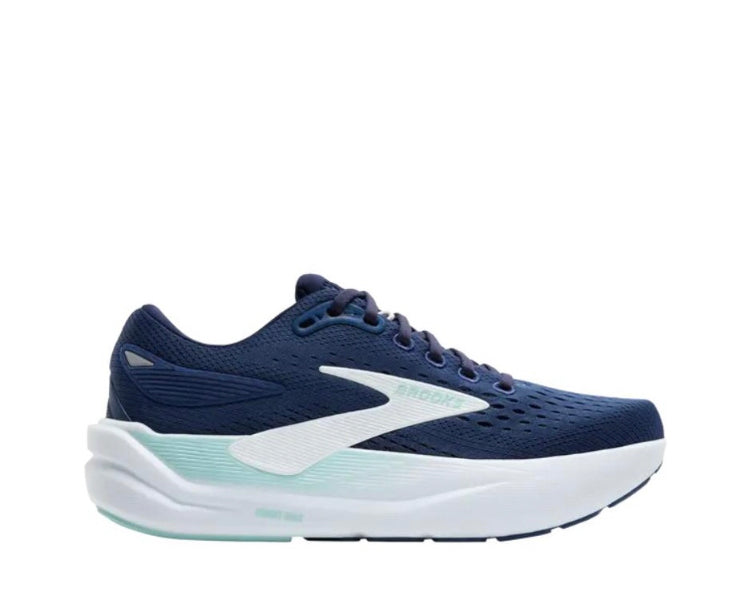 Navy blue lace-up running sneaker with white sole and mint accents