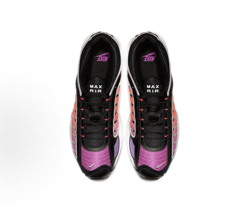 Purple and black Nike sneakers with black laces and 'MAX AIR' branding on tongue