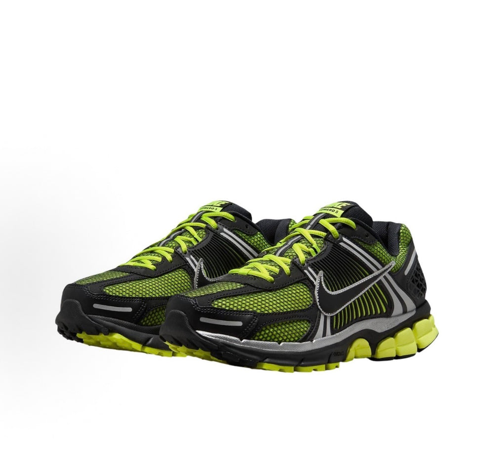 Nike Zoom Vomero 5 running shoes, side view: black mesh with neon green details