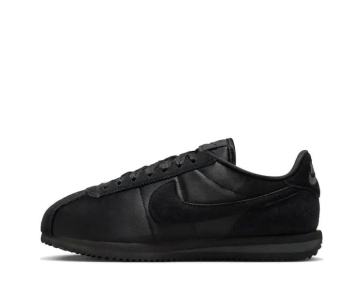 Nike Cortez sneakers in black with side Swoosh and textured rubber sole