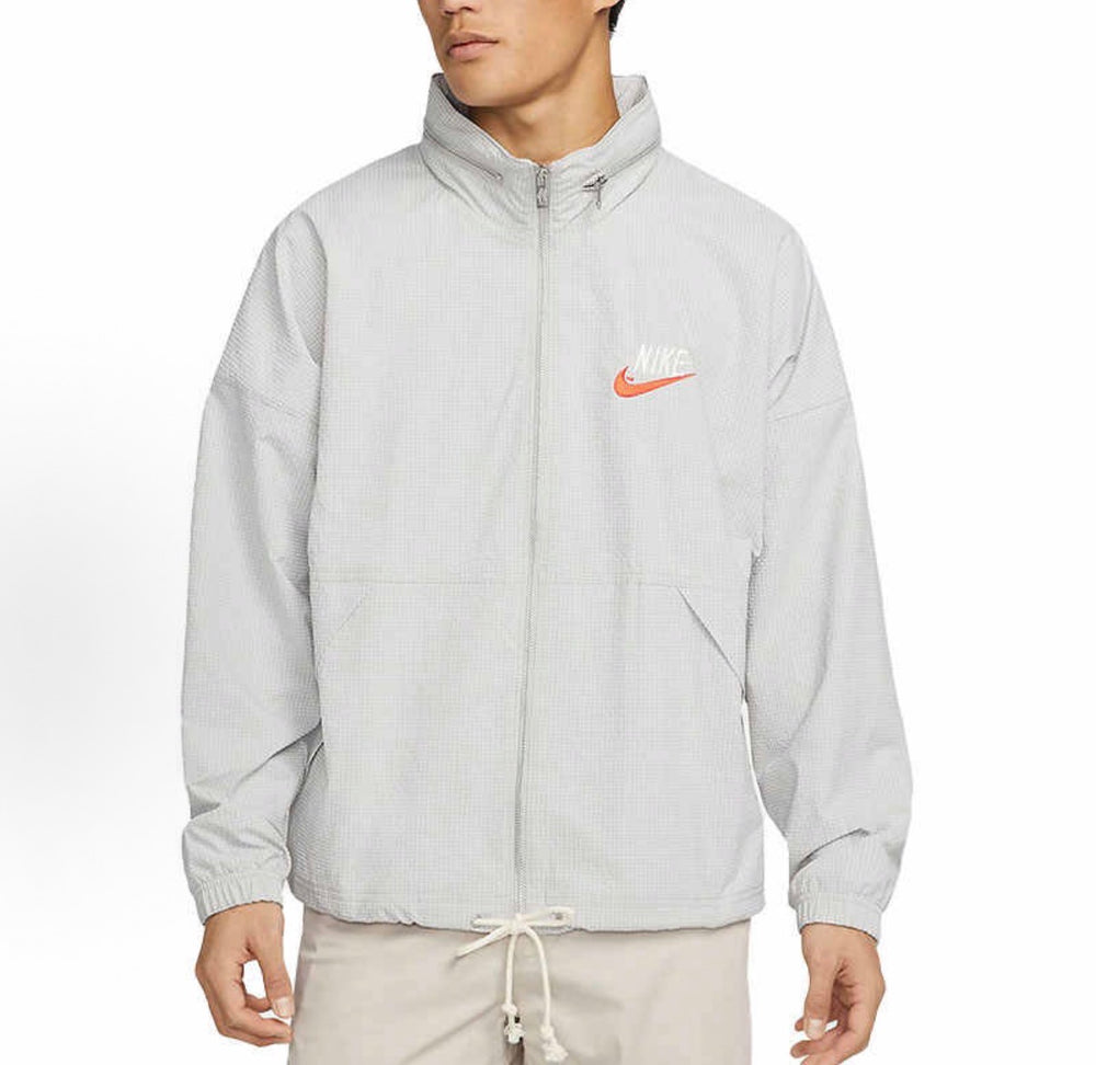 Light gray hooded windbreaker jacket with full-zip, drawstring hem and side pockets