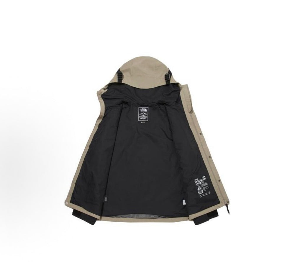 North Face hooded jacket with black interior lining and tan outer shell