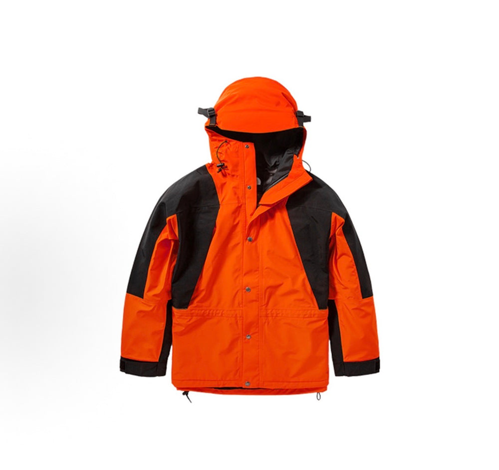 Orange parka jacket with black sleeves, adjustable hood, front buttoned placket, kangaroo pocket