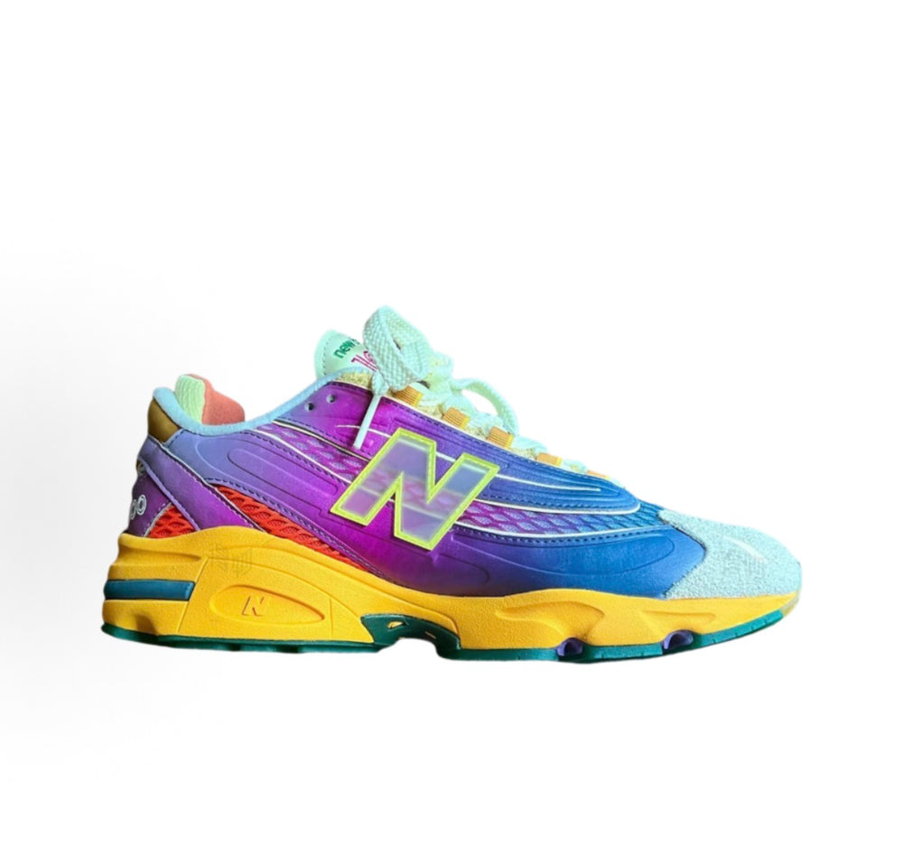 New Balance 1000 sneakers in purple, blue, yellow with neon laces and mesh panels