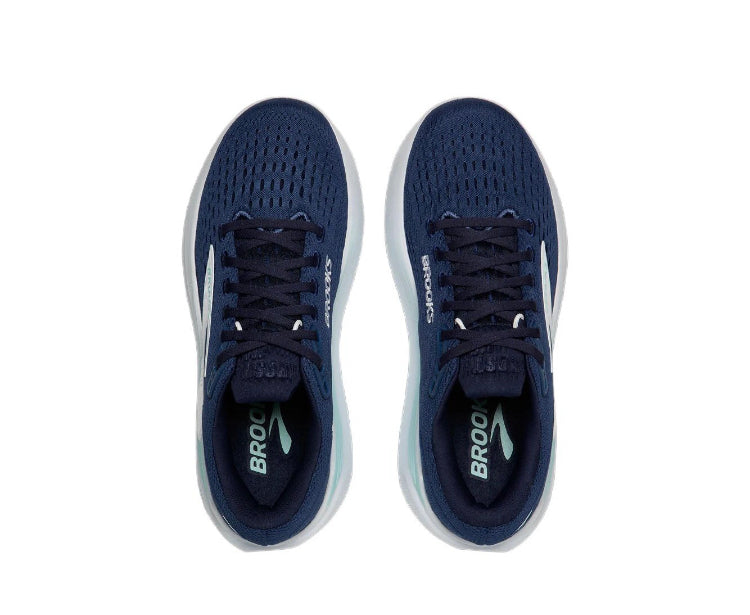 Pair of navy blue lace-up sneakers with mint logo and white midsoles