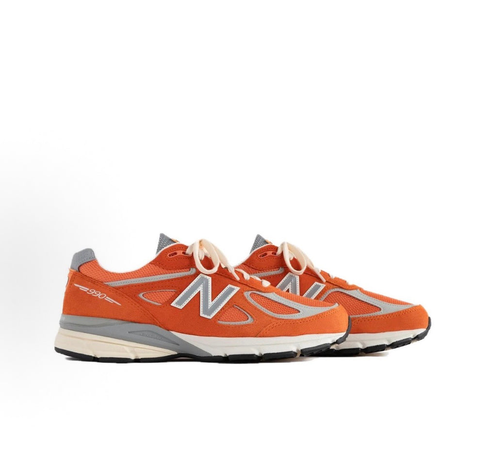 New Balance 990 running sneakers in orange with N logo and white laces