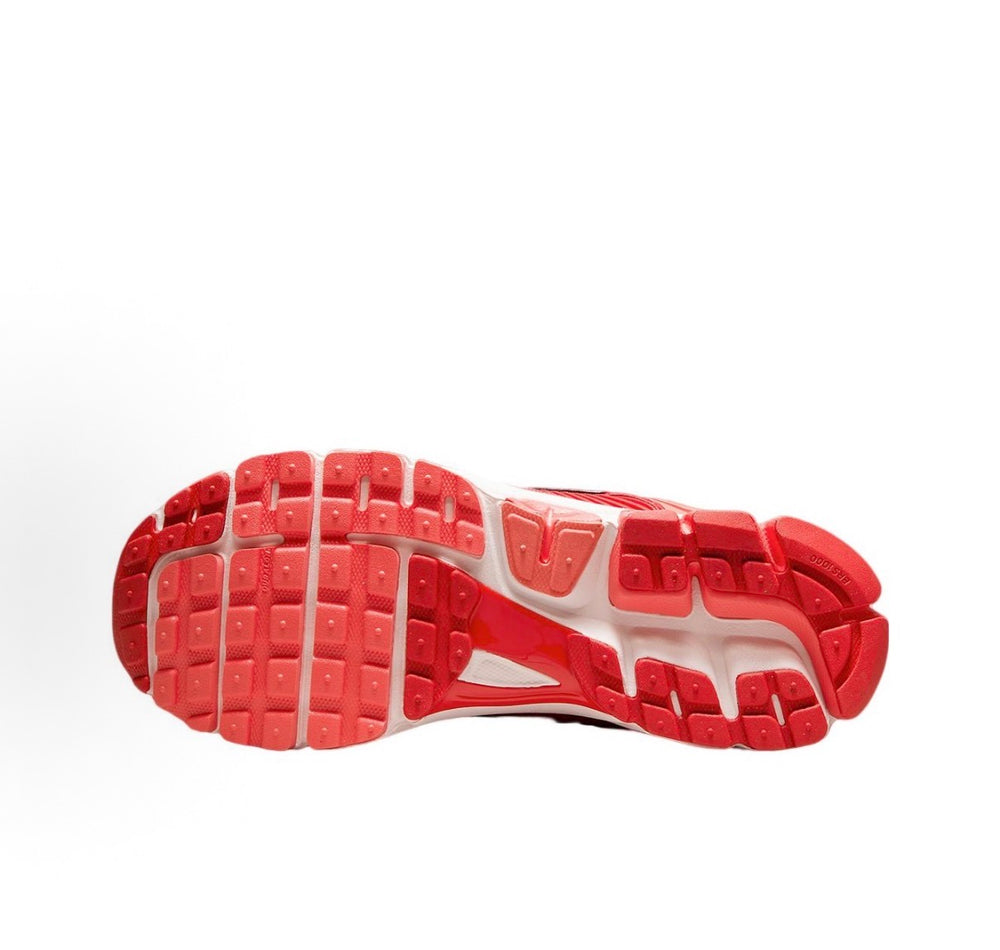 Sneaker outsole view with red traction and white midfoot support
