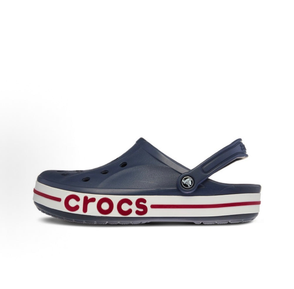 Crocs clog profile in dark navy with adjustable strap and red/white logo stripe