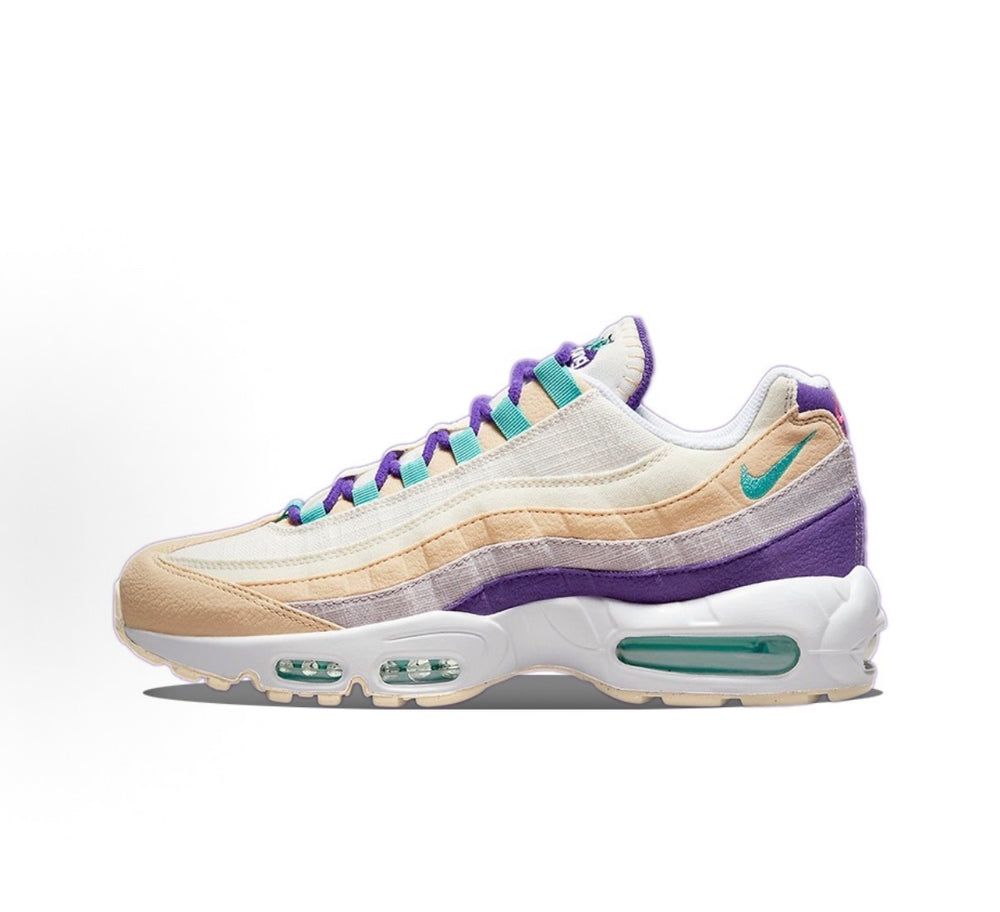 Nike Air Max 95 side profile with cream leather, purple trim, and teal lace accents