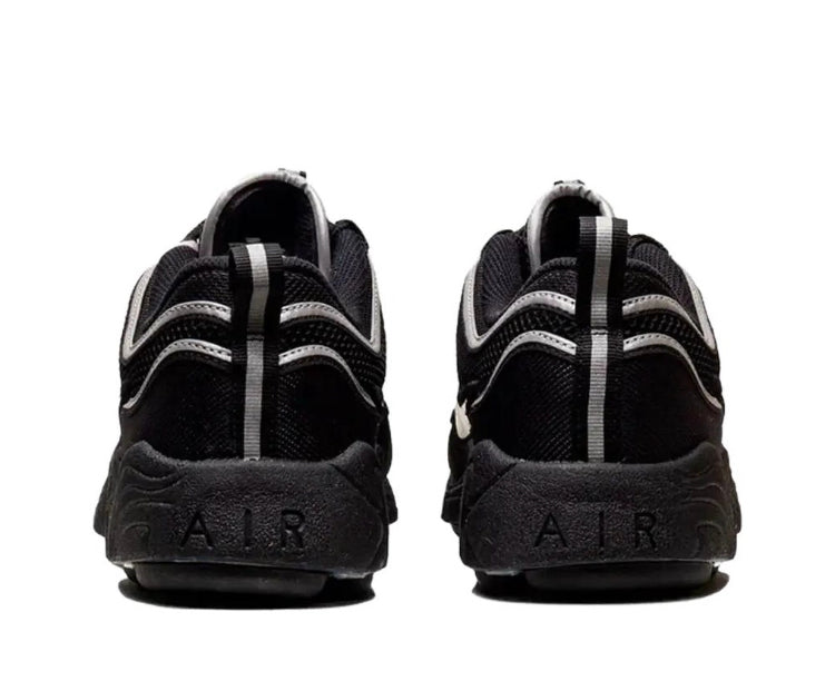 Black sneaker heel and Air logo with metallic silver side stripes