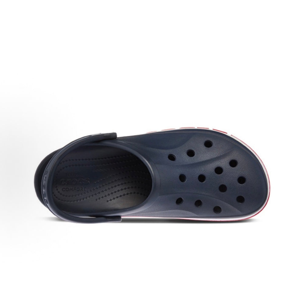 Crocs clog open-toe view with dark navy upper and perforated ventilation holes