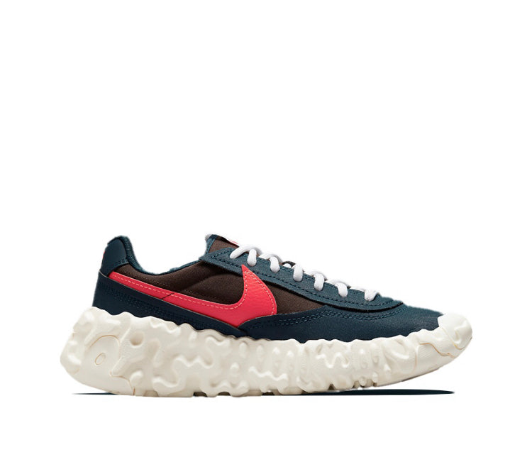Overbreak sneakers side view with dark navy upper, red swoosh, and white textured midsole
