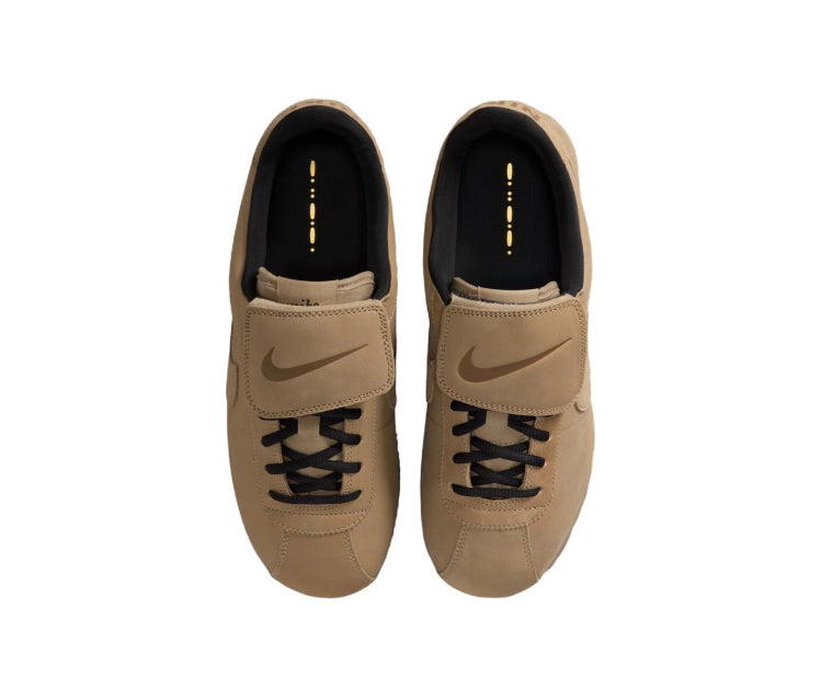 Cortez low-top sneakers, beige upper with black laces and NIKE tongue label