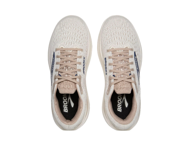 Pair of beige lace-up running shoes with blue logos and padded lining