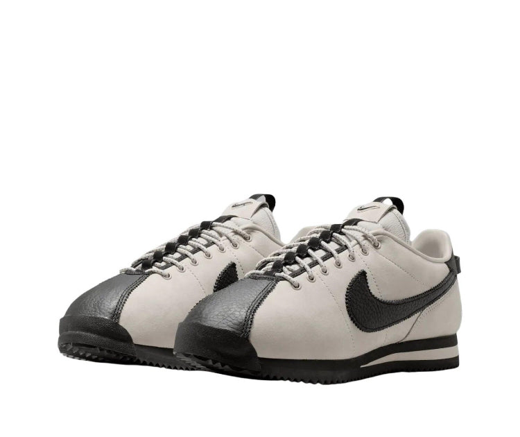 Cortez low-top sneakers, cream leather with black overlays and lace-up front