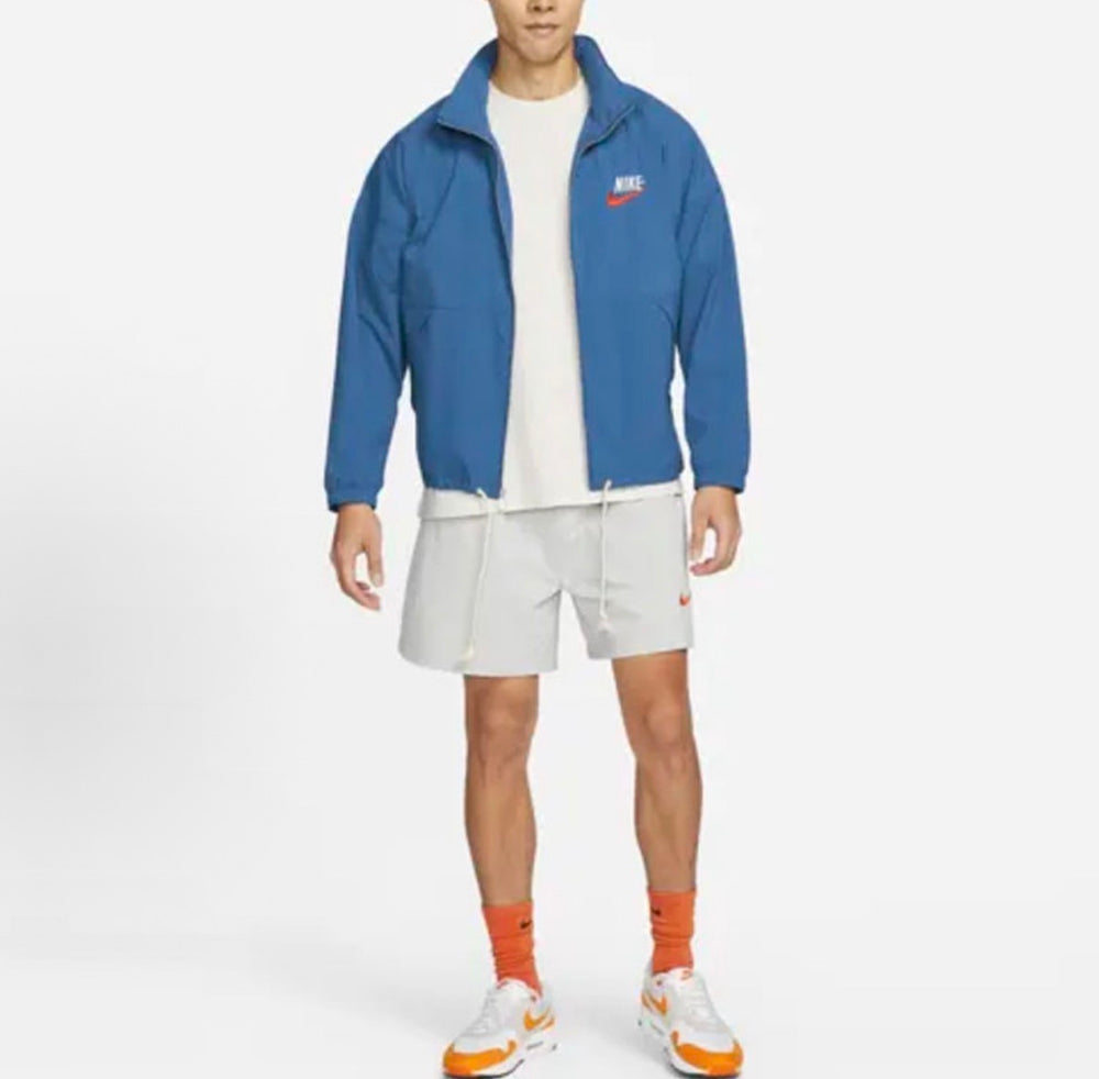 Nike woven hooded jacket in dark blue with full zip and front pockets