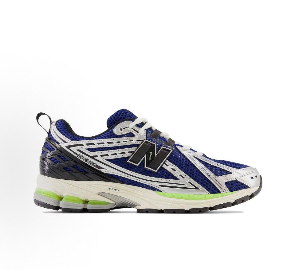 Blue and white low-top running sneaker with N logo, mesh panels, neon green sole