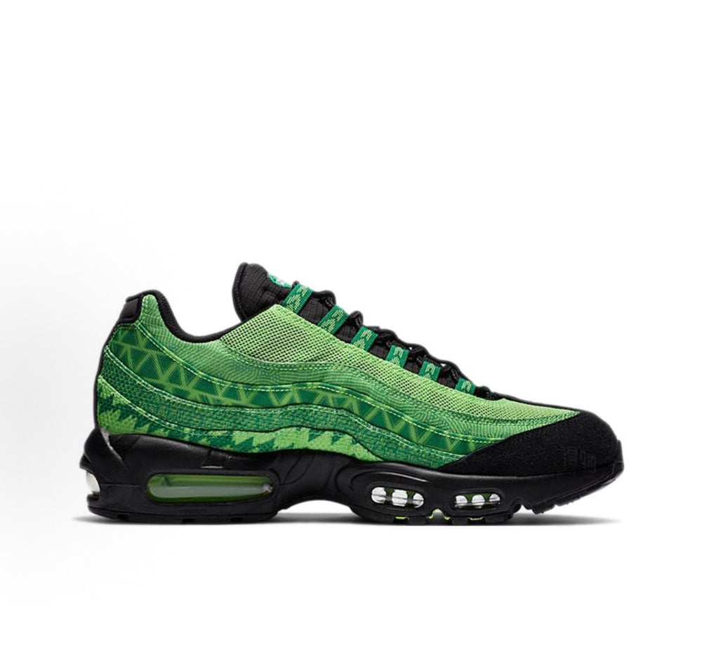 Nike Air Max 95 sneaker, side profile, green patterned panels with black midsole