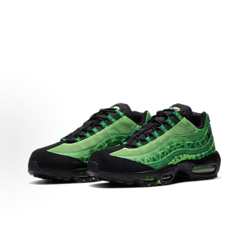 Nike Air Max 95 sneaker pair, front side view, green fabric overlays on black base