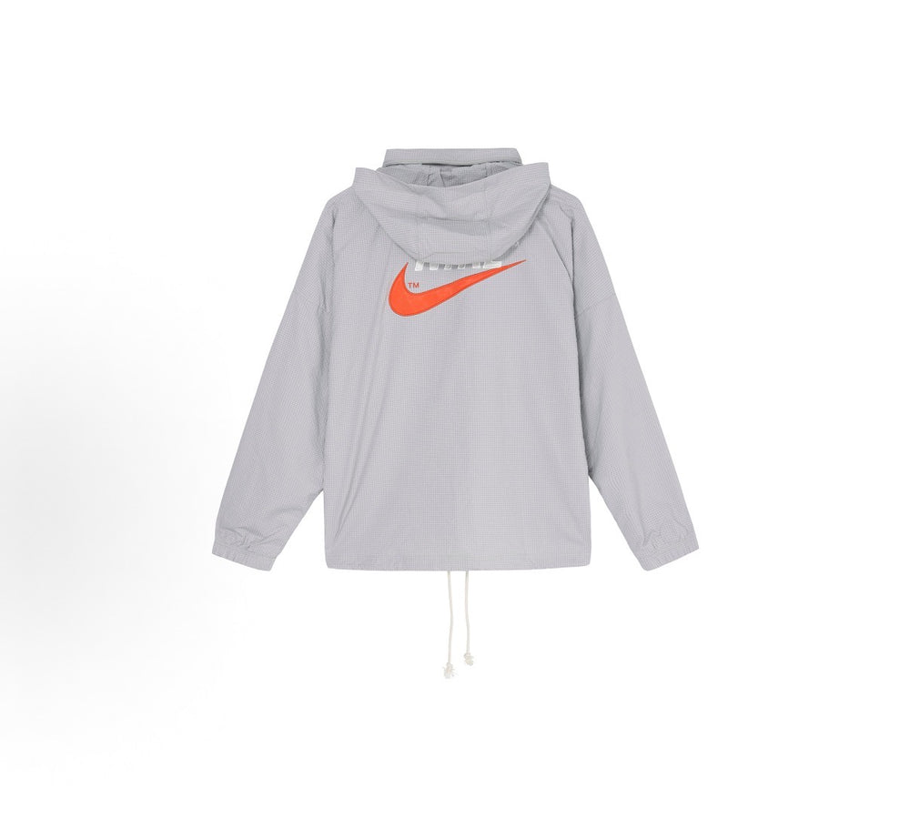 Light gray hooded Nike windbreaker jacket with orange swoosh, front zip