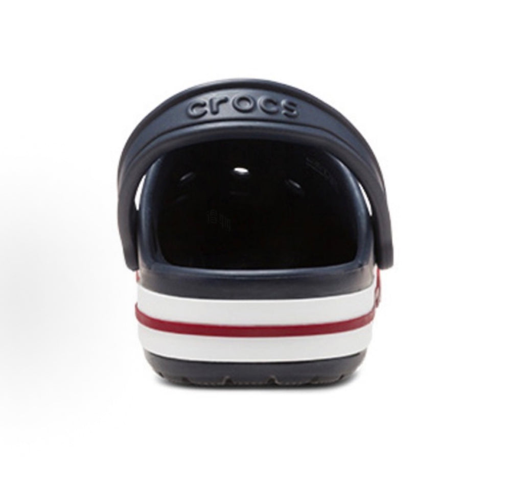Crocs clog back view with Crocs logo and red/white stripe on dark navy heel